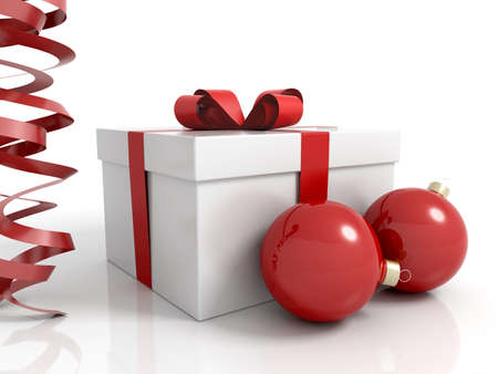 Box gift with christmas balls and ornament in a white backgroundの写真素材