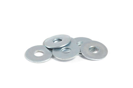 Galvanized steel washers on a white isolated backgroundの写真素材