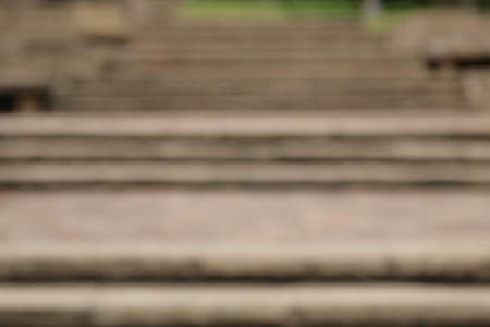 Unfocused background of an old stone stairs in a parkの写真素材