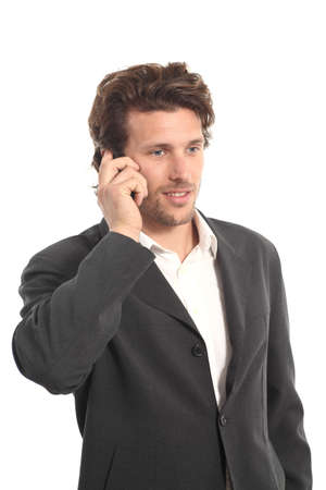 Business attractive young man with a phone on a white isolated background   の写真素材