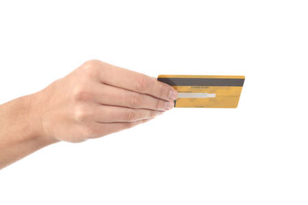 Woman hand with a credit card  on a white isolated background             の写真素材