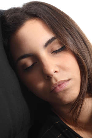 Beautiful girl sleeping portrait on a coachの写真素材