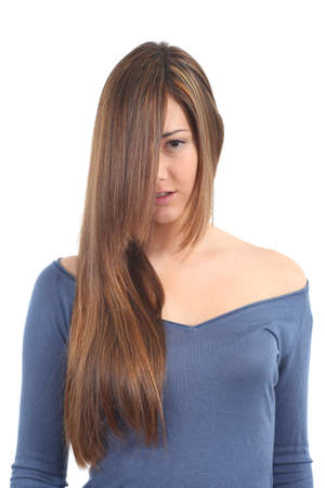 Long and beautiful straight hair of a woman on a white isolated background    の写真素材