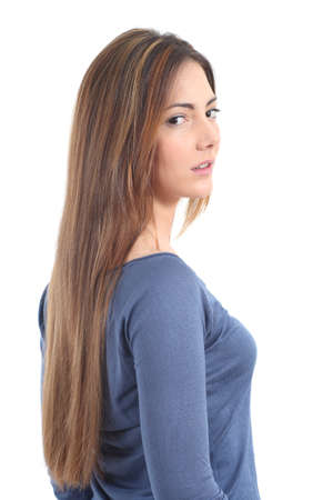 Beautiful woman with a long hair on a white isolated backgroundの写真素材