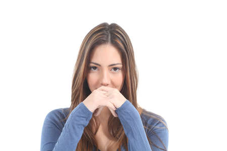 Serious woman facial expression on a white isolated background               の写真素材