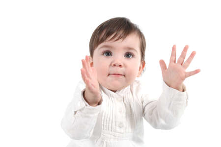 Baby clapping happy on a white isolated background          の写真素材