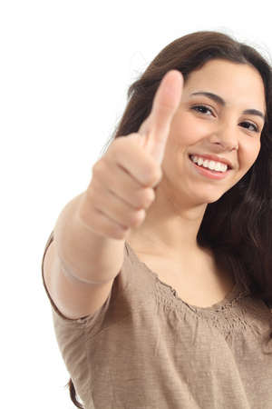 Beautiful woman with thumb up on a white isolated backgroundの写真素材