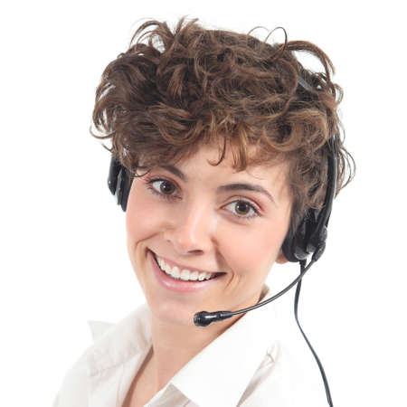 Beautiful and happy telephonist woman in a white isolated background                の写真素材