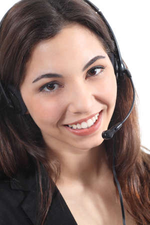 Beautiful and happy telephonist woman in a white isolated background                の写真素材
