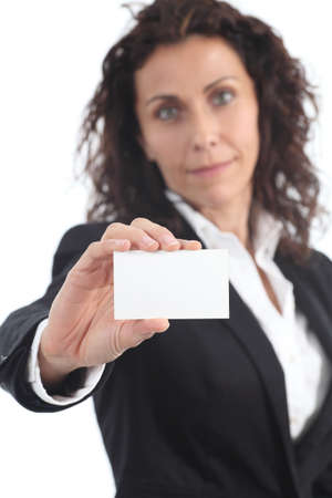 Beautiful mature businesswoman showing a blank business card  on a white isolatedの写真素材