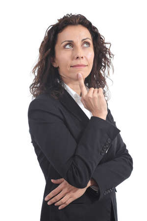 Beautiful mature businesswoman standing and pensive on a white isolated の写真素材