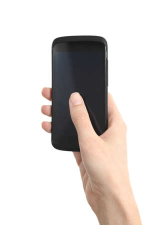 Woman hand holding and touching a mobile phone screen with her thumb on a white isolated background            の写真素材