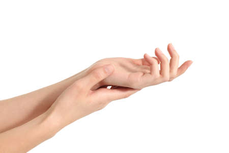 Beautiful woman hands rubbing on a white isolated backgroundの写真素材