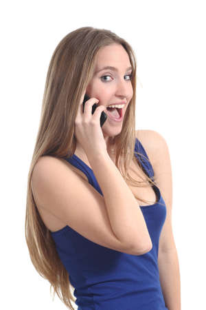 Woman happy on the mobile phone isolated on a white background               の写真素材