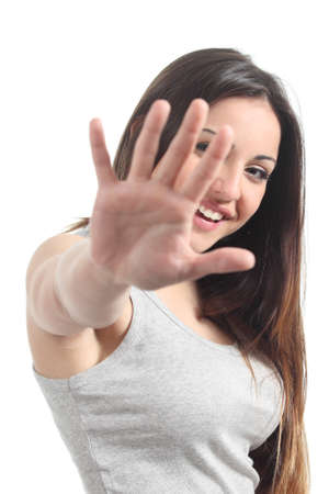Beautiful playful teenager saying no photos isolated on a white backgroundの写真素材
