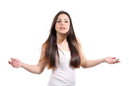 Beautiful teenager girl teasing isolated on a white background                 の写真素材