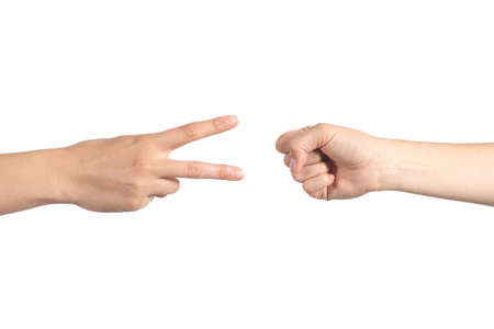 Rock paper and scissors hands gambling isolated on a white background. rock wins   の写真素材
