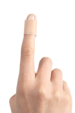 Forefinger of a woman hand with a band isolated on a white backgroundの写真素材