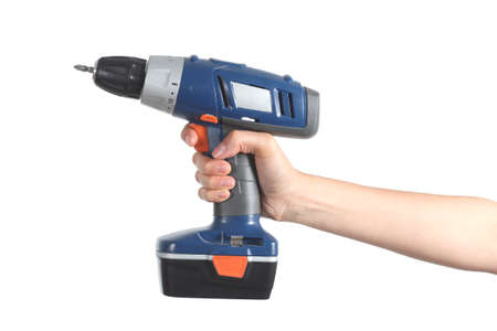 Profile of a woman hand holding a battery drill isolated on a white background            の写真素材