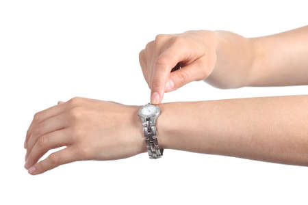 Woman hands gesturing too late with her watch isolated on a white background          の写真素材