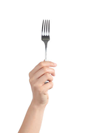 Woman hand holding up a fork isolated on a white background            の写真素材