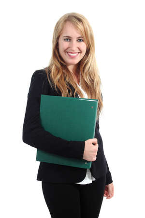 Beautiful businesswoman posing and holding a folder isolated on a white background             の写真素材