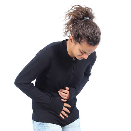 Teen girl with bellyache isolated on a white background