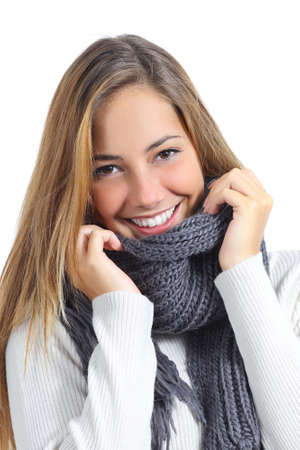 Close up of a beautiful woman smile wearing winter clothing isolated on a white backgroundの写真素材