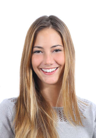 Portrait of a young woman with a perfect smile isolated on a white backgroundの写真素材