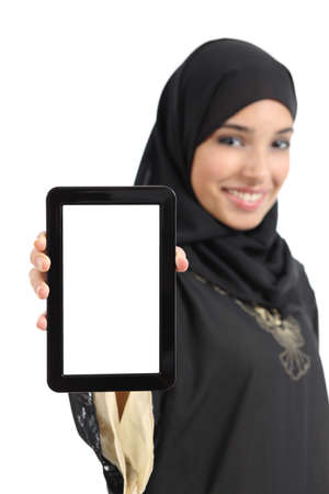 Beautiful arab woman showing a blank vertical tablet screen isolated isolated on a white の写真素材