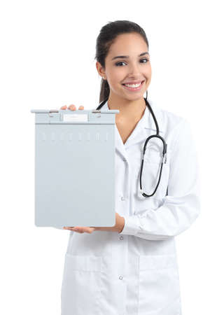 Beautiful doctor woman holding and showing a medical history folder isolated on a white の写真素材