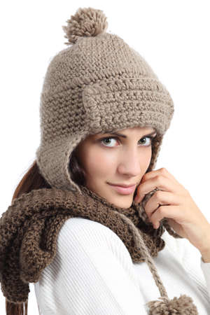 Facial woman portrait warmly clothed in winter isolated on a white background           の写真素材
