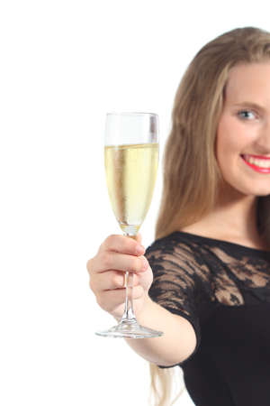 Close up of a beautiful woman toasting with champagne isolated on a white backgroundの写真素材