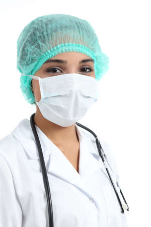 Female doctor with a surgical mask isolated on a white background           の写真素材