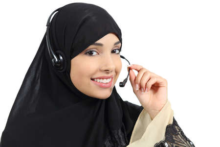 Beautiful phone operator arab woman working isolated on a white background    の写真素材