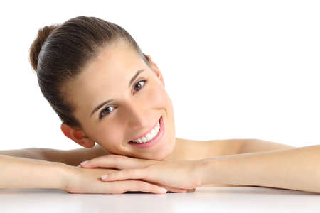 Portrait of a beautiful natural woman facial with a white perfect smile isolated on a white background                 の写真素材