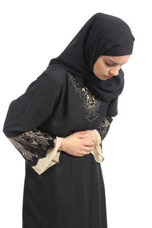 Arab saudi emirates woman with belly ache isolated on a white backgroundの写真素材