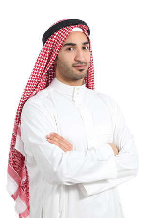 Serious arab saudi emirates man posing with folded arms isolated on a white background             の写真素材
