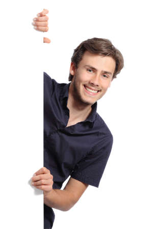 Young promoter man holding a blank banner isolated on a white background              の写真素材