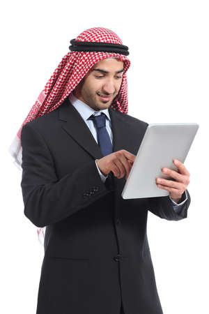 Arab saudi emirates businessman working with a tablet reader isolated on a white backgroundの写真素材