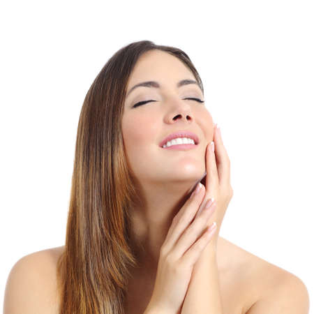 Beauty woman with perfect skin and manicure and white smile isolated on a white background               の写真素材