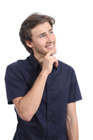 Handsome happy man thinking and looking at side isolated on a white の写真素材