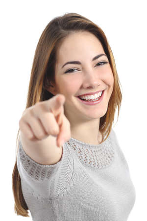 Funny teenager girl with white smile pointing at you isolated on a white background  の写真素材