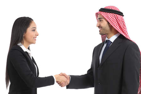 Side view of an arab saudi businesspeople handshaking isolated on a white background               の写真素材