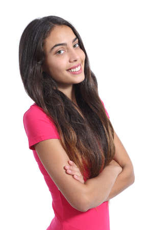 Pretty teenager model posing standing with folded arms isolated on a white backgroundの写真素材