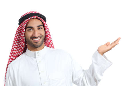 Arab saudi promoter man presenting a blank product isolated on a white backgroundの写真素材