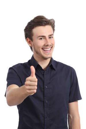 Funny standing happy man gesturing thumbs up isolated on a white backgroundの写真素材