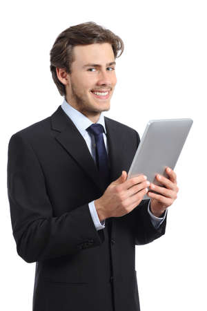Happy business man holding a tablet reader isolated on a white backgroundの写真素材
