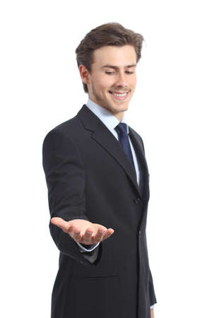 Happy businessman holding something or a blank product isolated on a white backgroundの写真素材