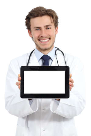 Happy doctor man showing a blank tablet screen software on a white backgroundの写真素材